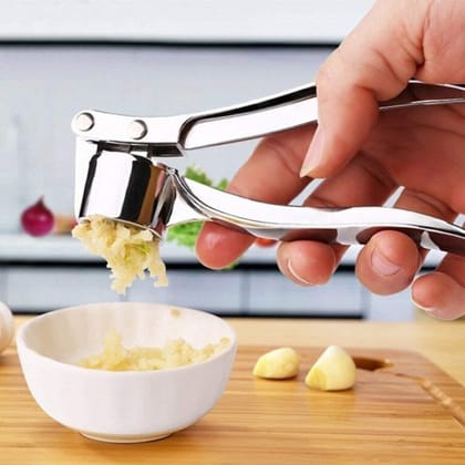 WUGO::Stainless Steel Garlic Crusher Presser Garlic Press Multi-Function Manual Portable Garlic Crusher Ginger Mincer Garlic Presser Curved Garlic Grinding Slicer for Kitchen/Garlic Mincer/Garlic Chopper/Lemon Juicer Hand Tool (Silver)