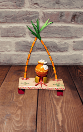 Here are some title suggestions:1. Wooden Pongal Pot Stand 2. Traditional Pongal Decoration3. Handmade Pongal Festival Decor4. South Indian Pongal Festival Decoration5. Pongal Pot Stand