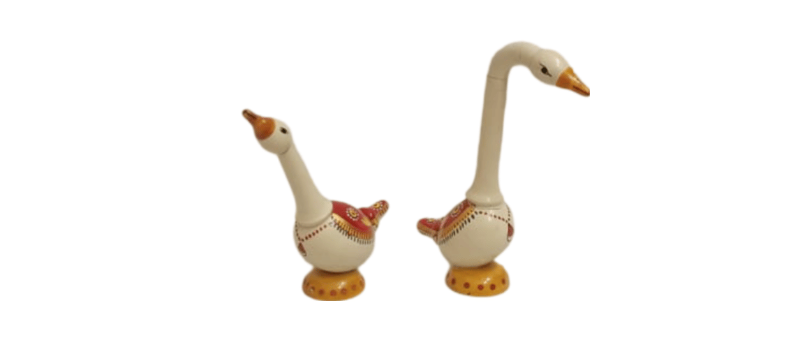 Pair of handcrafted wooden swans