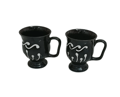 A Pair of Black and White Porcelain Cups with Unique Design pack of 2