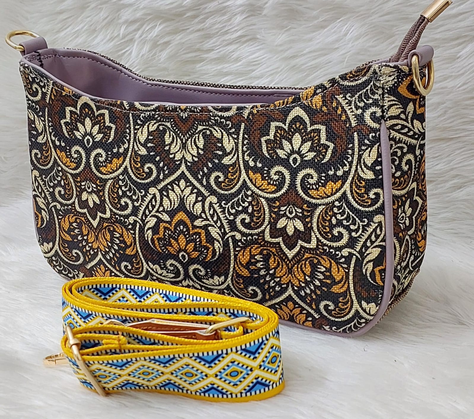 Brown and yellow floral print jute crossbody bag with adjustable strap