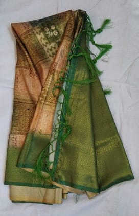 Green and gold zari woven soft silk saree with blouse piece