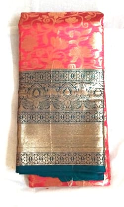 Red and gold zari woven Kanjivaram silk saree with blouse piece