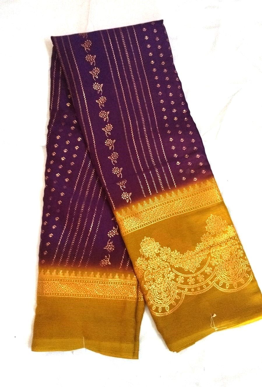 Maroon and gold zari silk saree with floral motifs