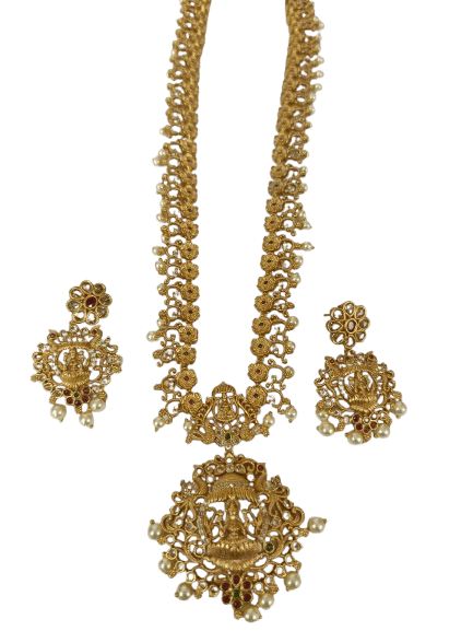 "Stunning antique gold plated traditional Indian earrings with intricate detailing and pearl drops."