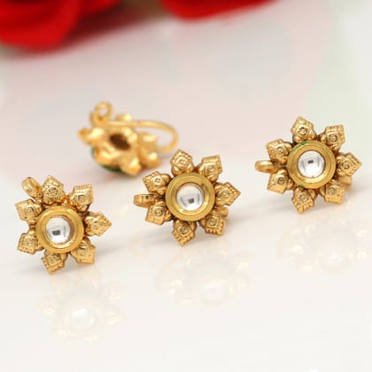 Rani Color Kundan Nose Pin Combo Of 4 Pieces (NSP165CMB)-Length: 2.50 CM x Width: 1.30 CM / Rani / Alloy With Good Quality Gold Plated