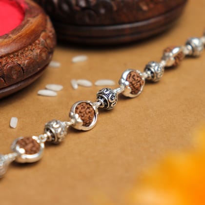 Silver Rakhi with Om Beads Capping and Rudraksha Bracelet