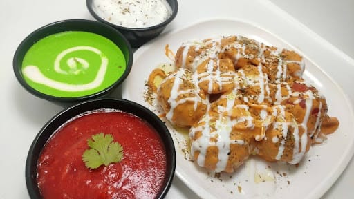 Paneer Butter Masala Momos