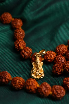 Aanandita Golden Lorrd Ganpati Murti Design Pendant