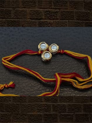 Round kundan rakhi in mauli thread