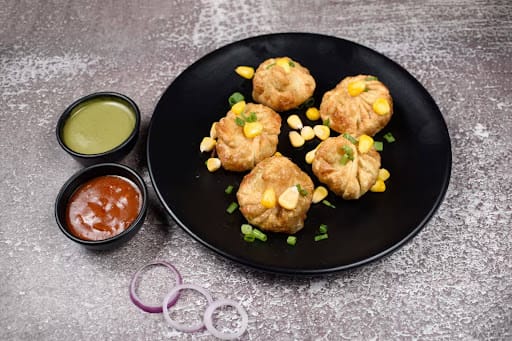 Veg Fried Corn Momos [8 Pieces]