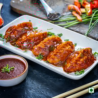 Veg Pahari Feast Pan Fried Momo In Schezwan Sauce(Spicy)