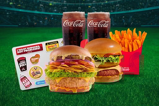 2 Premium Non Veg Burgers + 2 Beverages + Fries