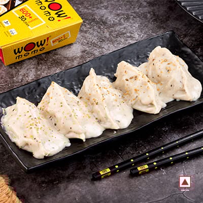 Chicken Himalayan Momo In Molten Cheesy Sauce