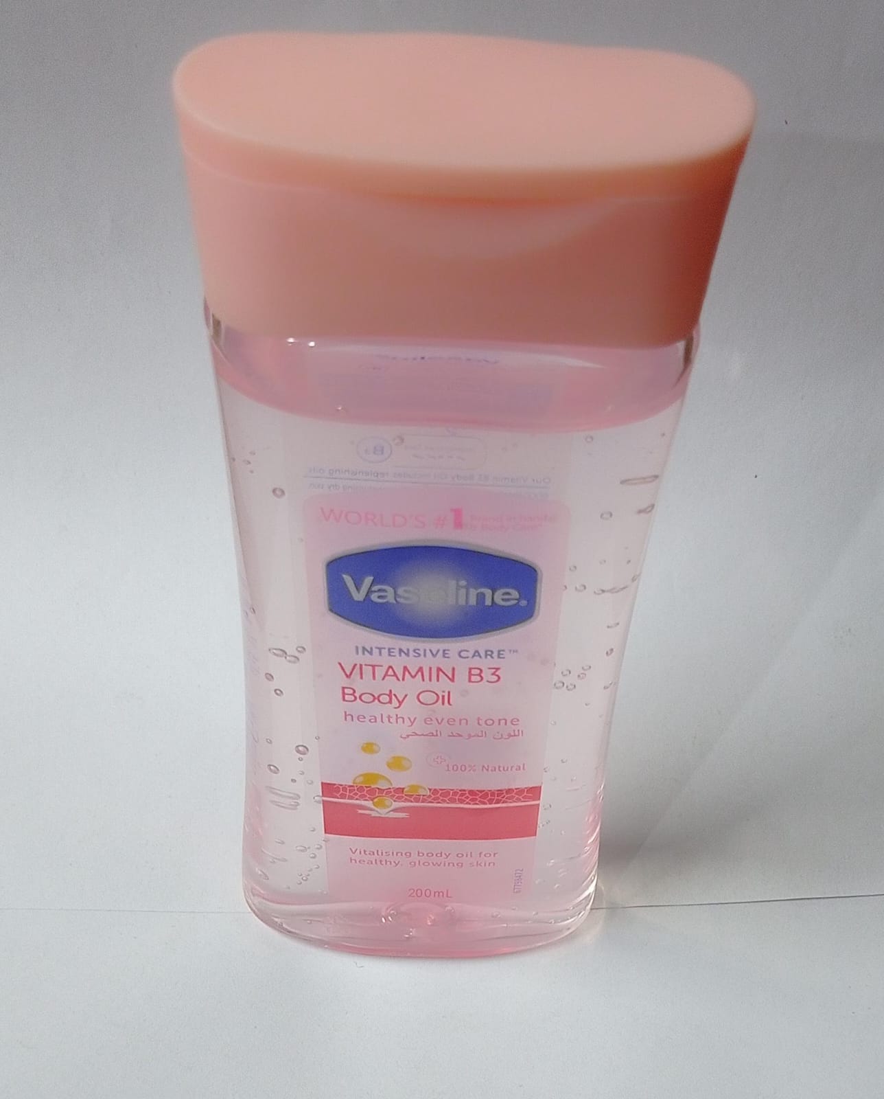 Nourishing Glow Vaseline Intensive Care Vitamin B3 Body Oil healthy even tone