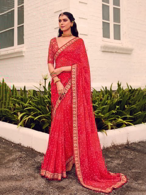 Orange Georgette bandhni Print Embroidery Border Saree