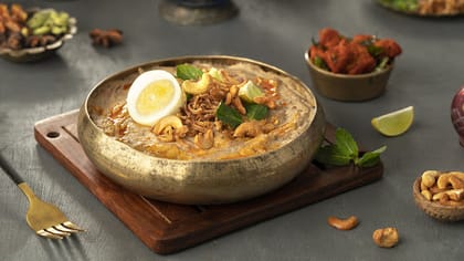 Mutton Haleem With Chicken 65 And Egg Topping