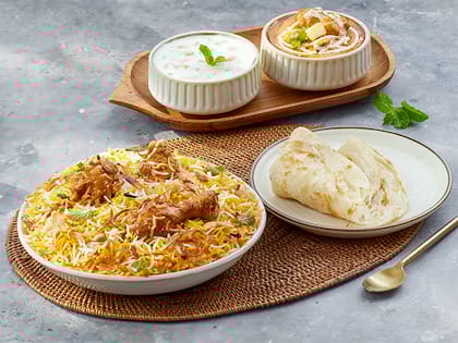Chicken Biryani And Butter Chicken Meal - Serves 1