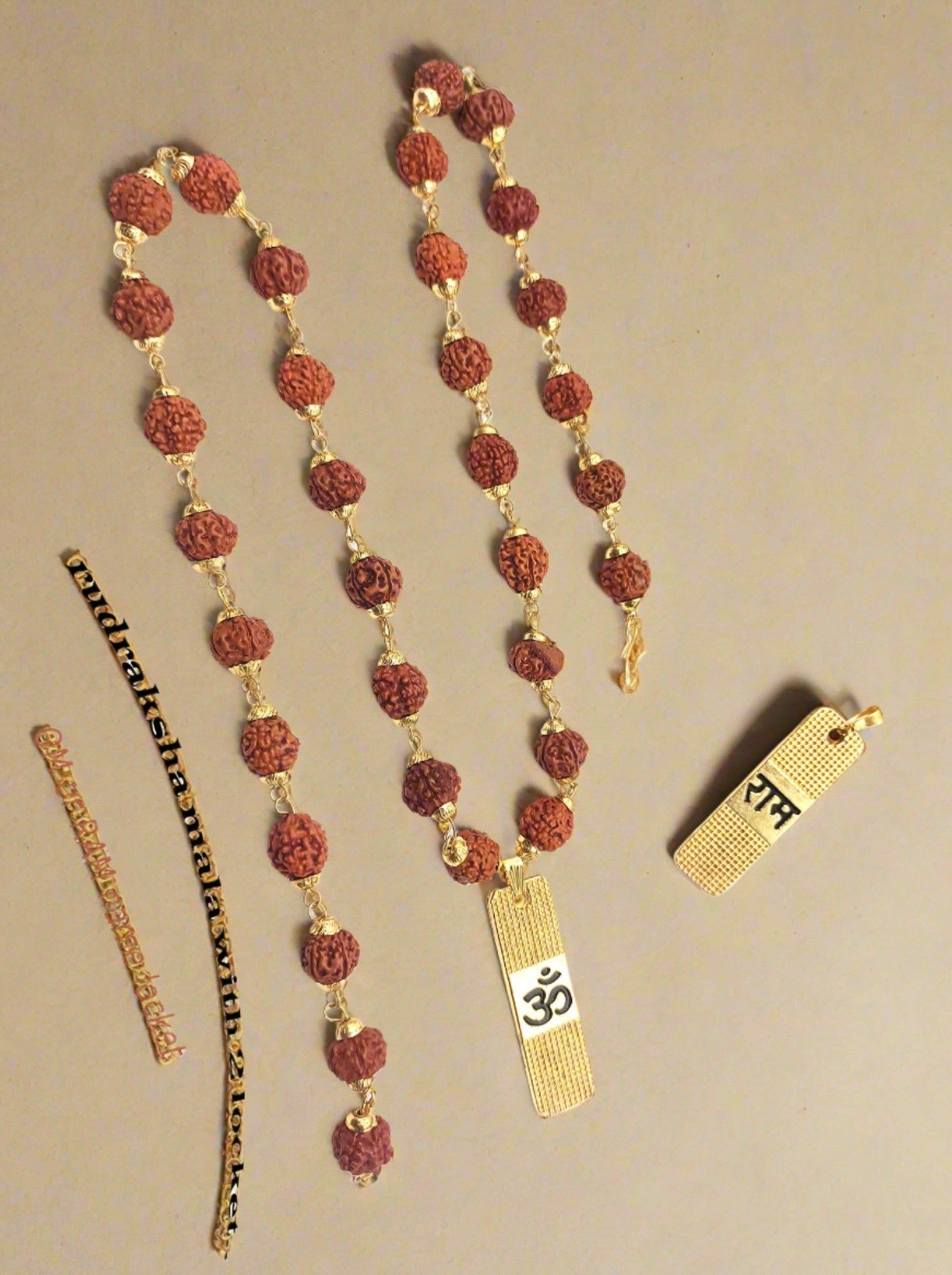 rudraksha mala with 2 locket om or ram name locket (pack of 2 locket)