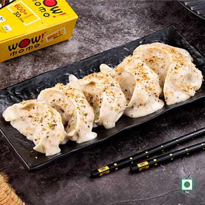 Veg Himalayan Momo In Molten Cheesy Sauce