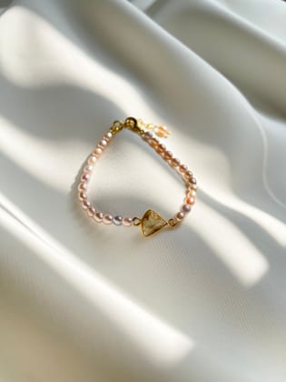 Manifest { blush }-BRASS